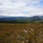 An amazing hike over the sunny highland plain in Kingussie, Scotland